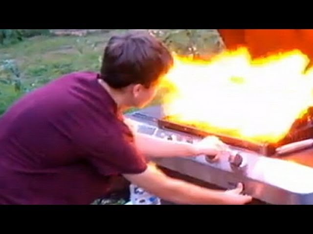 Dramatic but educational image of a grill fire on a residential balcony showing flames near combustible materials&nbsp;