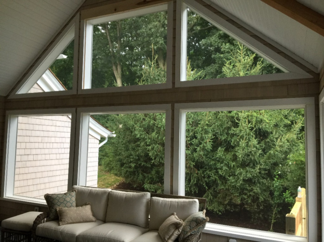Couch on gable end screen porch