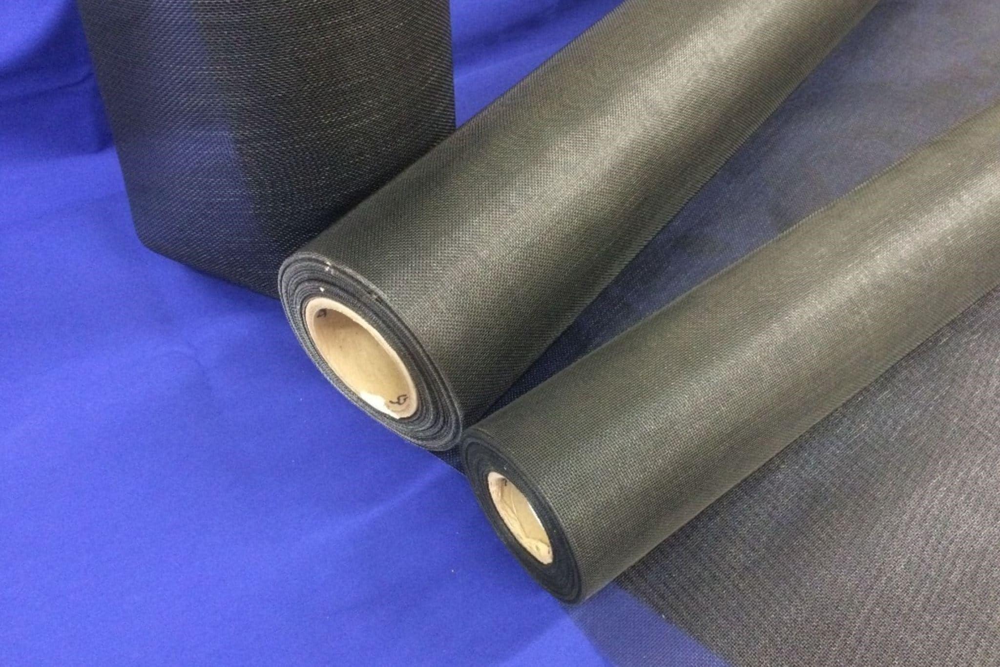 rolls of no see um screen material, a dark, thickly woven solution for keeping out small insects